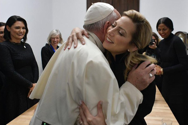 Pope Francis embraces Fabiola Yanez